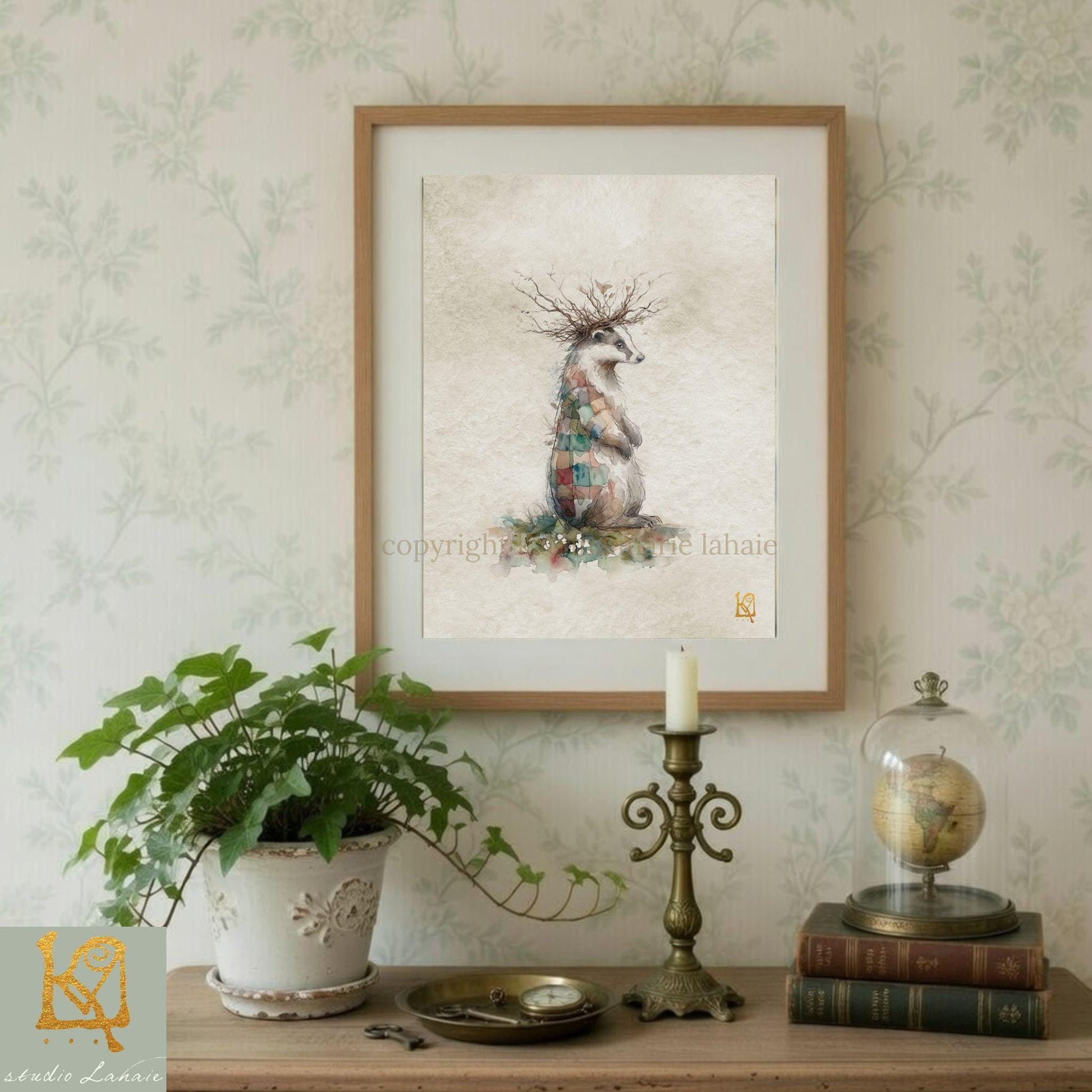 a framed painting of a bird with a crown, a potted plant, a candle, and some books on a shelf.