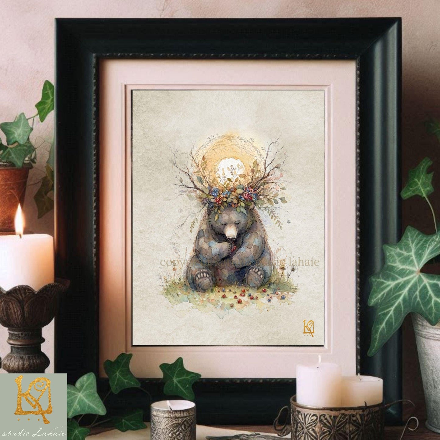 a framed painting of a bear sitting in a grassy field, surrounded by flowers and leaves, with a crown on its head.