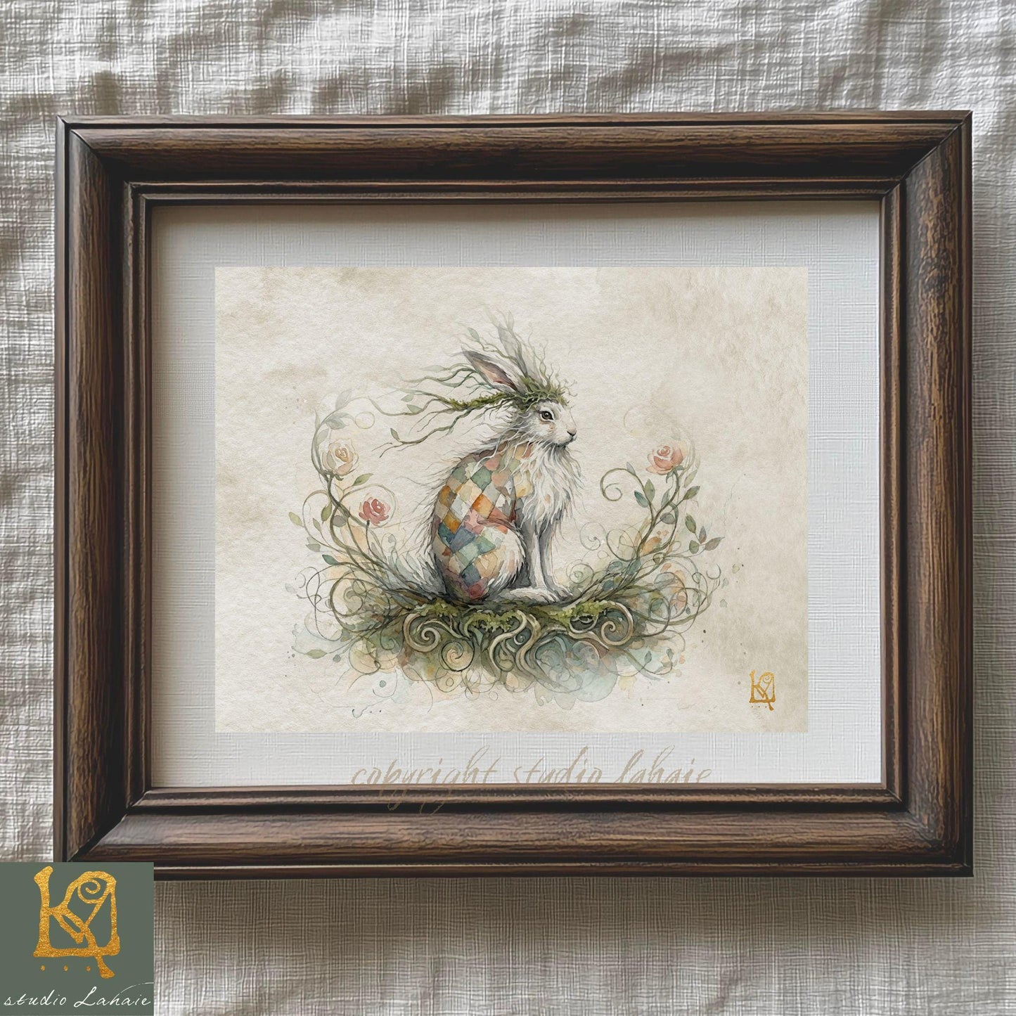 A framed illustration of a rabbit with a colorful, patterned coat sitting on a bed of flowers and plants.