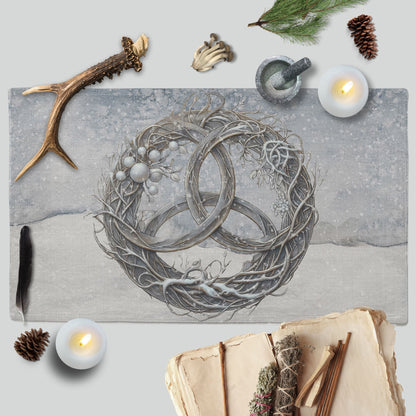 a painting of two rings surrounded by candles and other items